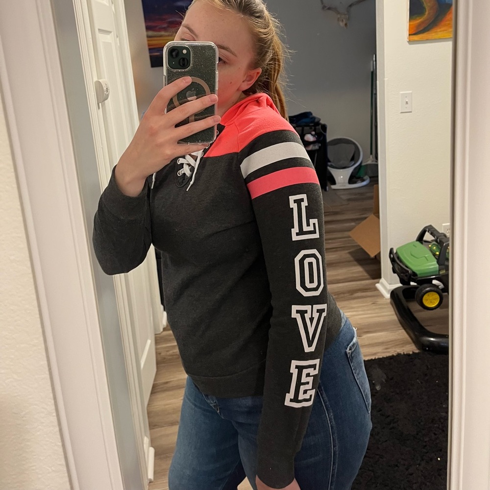 Jersey style Bobbie Brooks Pink sweatshirt hoodies with “LOVE” on sleeve (small)